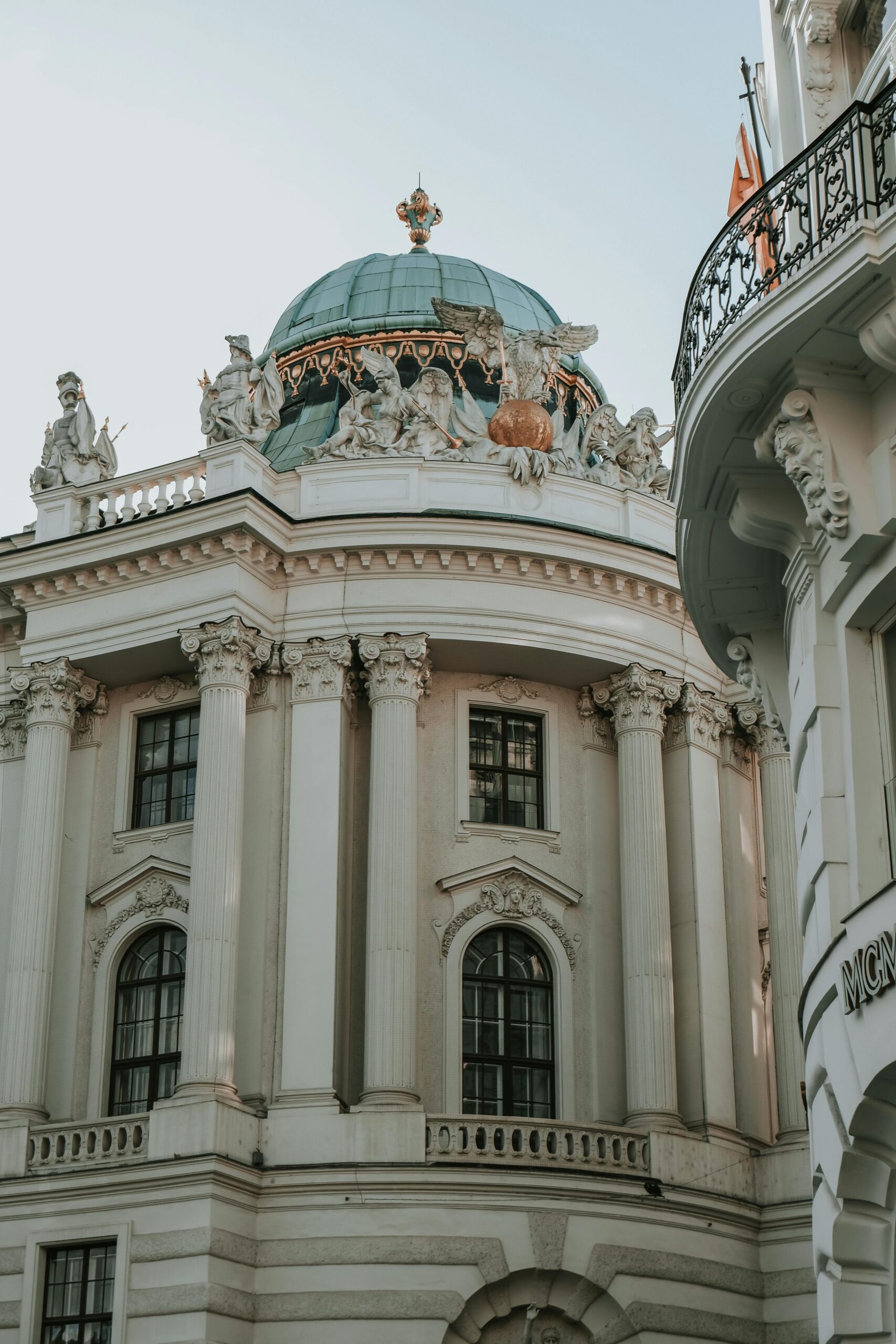 A building with a dome and a clock on top